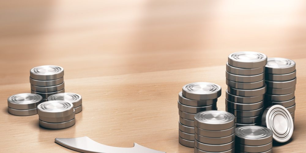 Two Piles of coins symbols on a wooden table and an arrow pointing the larger one. Financial profits concept. 3d illustration.